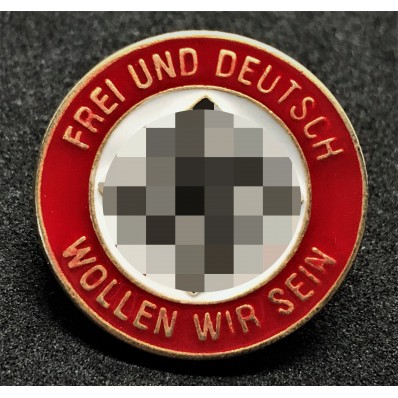Badge We Wish to be Free and German