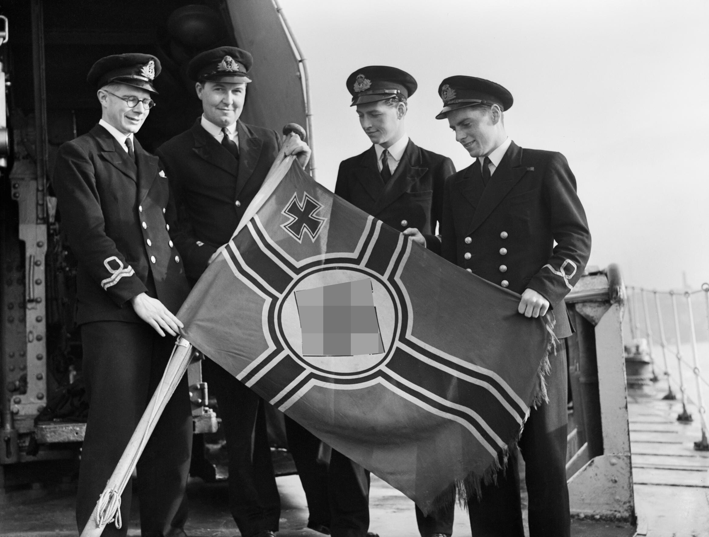 220px-Royal_Navy_officers_aboard_the_des